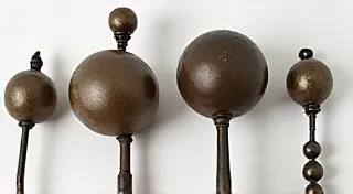 The Role of Weights and Pendants in Antique Clocks